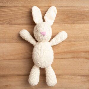 Hand knitted cream bunny baby toy